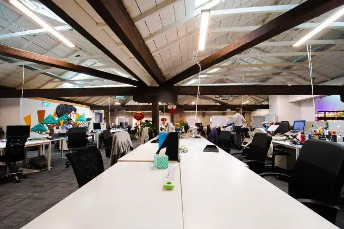 The HHQ coworking floor under the exposed beams